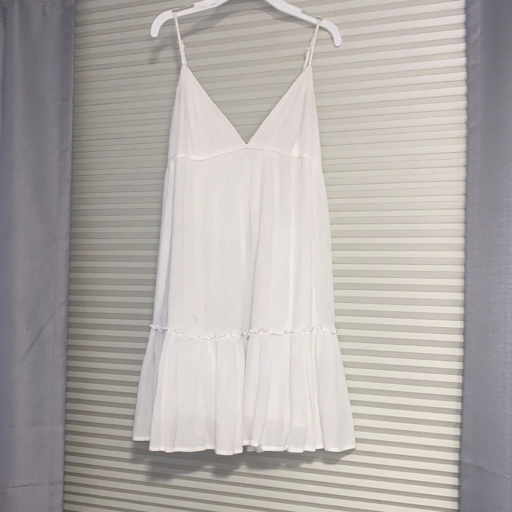 worn once, soft, and it has adjustable straps, a little short/for short people